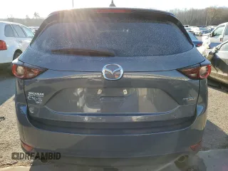 2021 Mazda CX-5 Touring with VIN JM3KFBCM5M0396053, listed as a Copart auction lot 83620274 with 50,463 mi miles and Salvage Title. Bid and sale history available at carsss.com. Image 6.