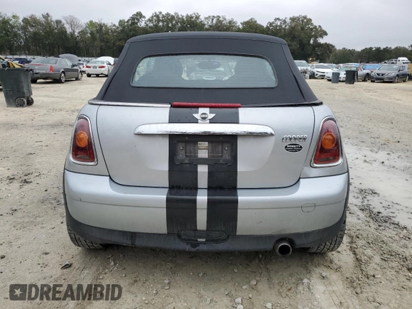 2009 MINI Convertible с VIN WMWMR33579TU95581, выставлен на аукционе Copart как лот 45914735 с пробегом 129 790 миль миль и Списание • Salvage title. История ставок и продаж доступна на DreamBid. Изображение 6.