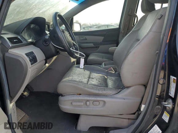 2012 Honda Odyssey Touring with VIN 5FNRL5H9XCB022284, listed as a Copart auction lot 82766824 with Not provided miles and Salvage title. Bid and sale history available at DreamBid. Image 7.