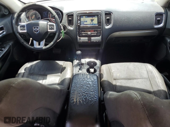 2012 Dodge Durango SXT z VIN 1C4RDHAG0CC329788, wystawiony jako Copart lot #61101745 z przebiegiem 208 302 mil mil oraz Szkoda całkowita • Salvage title. Historia ofert i sprzedaży dostępna na DreamBid. Obrazek 8.