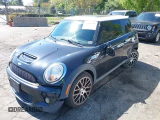 2009 MINI Hardtop S with VIN WMWMF73509TW82466, listed as a IAAI auction lot 42056740 with 113,755 mi miles and . Bid and sale history available at DreamBid. Image 2.