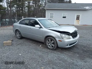 2007 Kia Optima EX with VIN KNAGE124375162317, listed as a IAAI auction lot 41246445 with 174,128 mi miles. Bid and sale history available at carsss.com. Image 1.