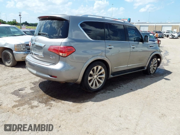 2013 Infiniti QX56 with VIN JN8AZ2NEXD9060450, listed as a IAAI auction lot 42388986 with 124,129 mi miles and . Bid and sale history available at DreamBid. Image 4.