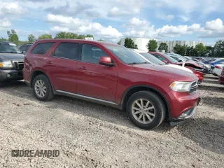 2015 Dodge Durango SXT with VIN 1C4RDJAG8FC147543, listed as a Copart auction lot 65713485 with 209,010 mi miles and Salvage title. Bid and sale history available at DreamBid. Image 4.