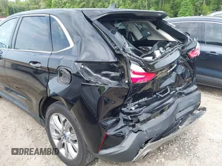 2021 Ford Edge Titanium z VIN 2FMPK3K99MBA16882, wystawiony jako IAAI lot #42214606 z przebiegiem 140 031 mil mil oraz . Historia ofert i sprzedaży dostępna na DreamBid. Obrazek 17.