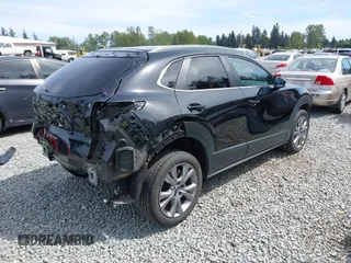 2023 Mazda CX-30 S Carbon Edition with VIN 3MVDMBCM3PM562447, listed as a IAAI auction lot 42174280 with 22,028 mi miles and . Bid and sale history available at DreamBid. Image 4.