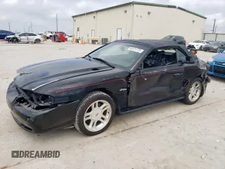 1998 Ford Mustang GT z VIN 1FAFP45X2WF272659, wystawiony jako Copart lot #54121775 z przebiegiem 83 338 mil mil oraz Szkoda całkowita • Salvage title. Historia ofert i sprzedaży dostępna na DreamBid. Obrazek 1.