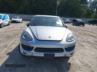 2012 Porsche Cayenne S Hybrid z VIN WP1AE2A20CLA92424, wystawiony jako IAAI lot #42315279 z przebiegiem 129 119 mil mil oraz . Historia ofert i sprzedaży dostępna na DreamBid. Obrazek 6.