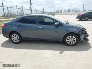 2016 Toyota Corolla L with VIN 5YFBURHE9GP376830, listed as a IAAI auction lot 41809480 with 106,922 mi miles. Bid and sale history available at carsss.com. Image 13.