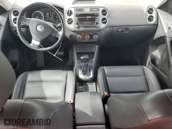 2010 Volkswagen Tiguan Wolfsburg Edition with VIN WVGAV7AX7AW003188, listed as a Copart auction lot 56692535 with 121,502 mi miles and Salvage title. Bid and sale history available at DreamBid. Image 8.