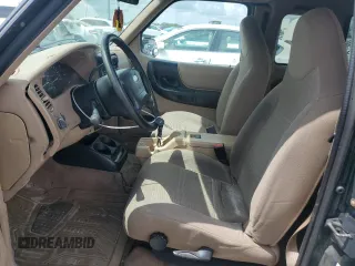2002 Ford Ranger XLT Appearance with VIN 1FTYR44E42TA32828, listed as a Copart auction lot 60205715 with 290,846 mi miles and Salvage title. Bid and sale history available at DreamBid. Image 7.