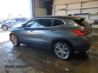 2019 BMW X2 xDrive28i with VIN WBXYJ5C57K5N73393, listed as a Copart auction lot 82910154 with 21,138 mi miles and Salvage Title. Bid and sale history available at carsss.com. Image 2.