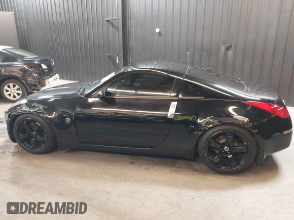 2005 Nissan 350Z Touring with VIN JN1AZ34E45M653631, listed as a IAAI auction lot 41689560 with 147,635 mi miles. Bid and sale history available at carsss.com. Image 6.
