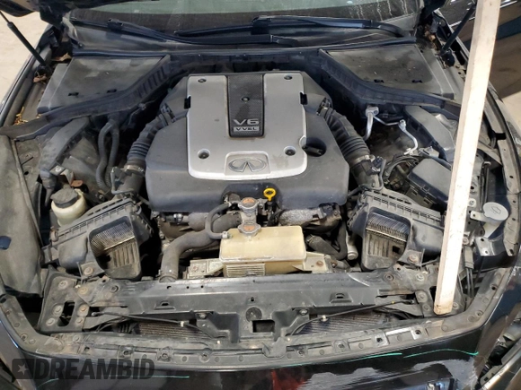 2014 Infiniti Q50 Premium with VIN JN1BV7ARXEM695977, listed as a Copart auction lot 52209795 with 100,700 mi miles and Salvage Title. Bid and sale history available at DreamBid. Image 13.