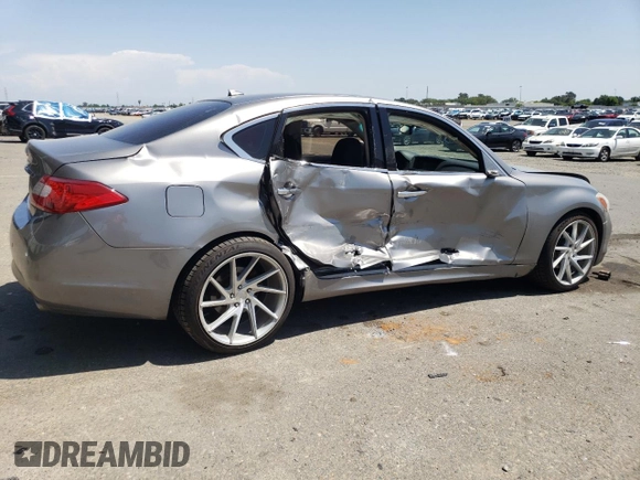 2013 Infiniti M with VIN JN1BY1AP2DM511973, listed as a Copart auction lot 55351815 with 126,888 mi miles and Salvage title. Bid and sale history available at DreamBid. Image 3.