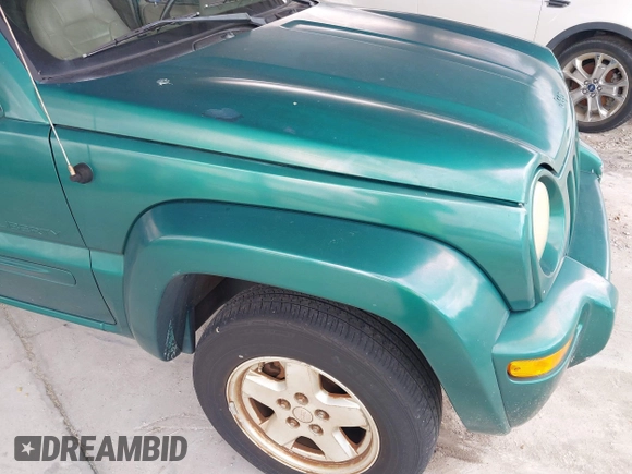 2004 Jeep Liberty Limited with VIN 1J4GK58K94W104382, listed as a IAAI auction lot 40214679 with 143,836 mi miles. Bid and sale history available at carsss.com. Image 12.