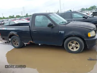 1998 Ford F-150 with VIN 1FTYF17W0WNC12927, listed as a IAAI auction lot 42621641 with 251,079 mi miles and . Bid and sale history available at DreamBid. Image 13.