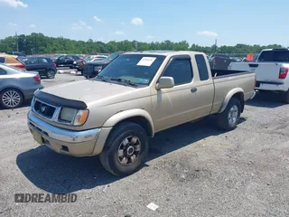 1999 Nissan Frontier XE with VIN 1N6ED26Y2XC321255, listed as a IAAI auction lot 42580192 with 147,006 mi miles and . Bid and sale history available at DreamBid. Image 2.
