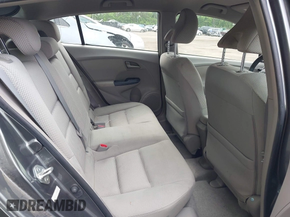 2010 Honda Insight EX with VIN JHMZE2H73AS025856, listed as a IAAI auction lot 42183307 with 71,564 mi miles and . Bid and sale history available at DreamBid. Image 8.