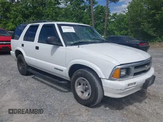 1997 Chevrolet Blazer LS z VIN 1GNCS13W4V2255783, wystawiony jako IAAI lot #42189033 z przebiegiem 175 373 mil mil oraz . Historia ofert i sprzedaży dostępna na DreamBid. Obrazek 1.