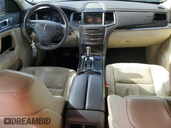 2014 Lincoln MKS with VIN 1LNHL9EK7EG606902, listed as a Copart auction lot 41837775 with 138,764 mi miles and Salvage Title. Bid and sale history available at DreamBid. Image 8.