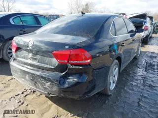 2012 Volkswagen Passat SE w/Sunroof with VIN 1VWBP7A31CC077742, listed as a IAAI auction lot 41489979 with 152,508 mi miles. Bid and sale history available at carsss.com. Image 4.