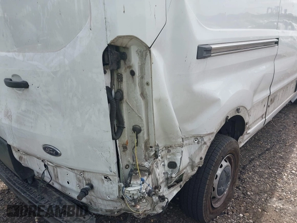 2016 Ford Transit Cargo with VIN 1FTYR2CM2GKA13205, listed as a IAAI auction lot 42697411 with 112,854 mi miles and . Bid and sale history available at DreamBid. Image 6.