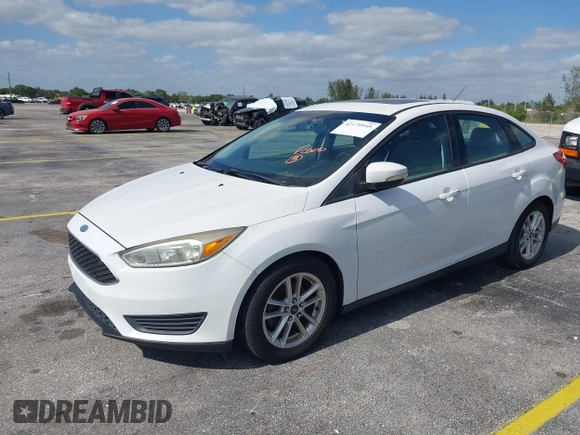 2015 Ford Focus SE with VIN 1FADP3F23FL329375, listed as a IAAI auction lot 42170945 with 114,180 mi miles. Bid and sale history available at carsss.com. Image 2.