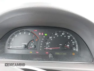 2004 Toyota Camry LE with VIN JTDBF32K740152841, listed as a IAAI auction lot 41808909 with 142,611 mi miles. Bid and sale history available at carsss.com. Image 7.