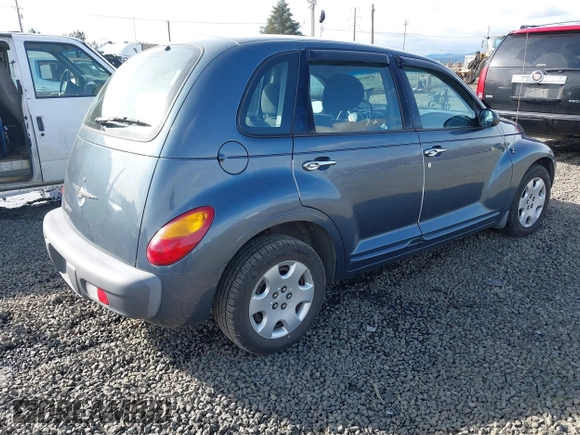 2003 Chrysler PT Cruiser with VIN 3C4FY48B13T570032, listed as a IAAI auction lot 41603951 with 97,590 mi miles. Bid and sale history available at carsss.com. Image 4.