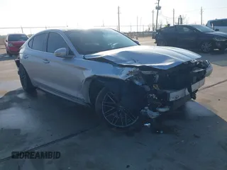 2019 Genesis G70 2.0T Advanced with VIN KMTG34LA5KU023157, listed as a IAAI auction lot 41490171 with 83,971 mi miles. Bid and sale history available at carsss.com. Image 1.