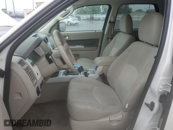 2009 Mercury Mariner with VIN 4M2CU91G09KJ20829, listed as a Copart auction lot 56006615 with 163,513 mi miles and Salvage title. Bid and sale history available at DreamBid. Image 7.