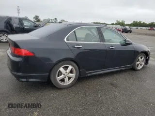2006 Acura TSX Navi z VIN JH4CL959X6C024778, wystawiony jako Copart lot #60128995 z przebiegiem 148 377 mil mil oraz Czysty tytuł • Clean title. Historia ofert i sprzedaży dostępna na DreamBid. Obrazek 3.