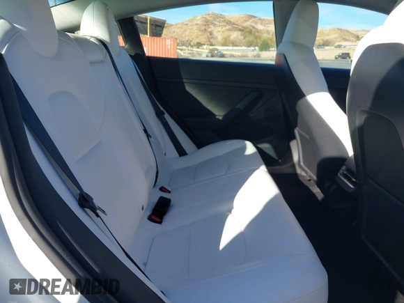 2023 Tesla Model 3 with VIN 5YJ3E1EAXPF486639, listed as a IAAI auction lot 41387797 with 18,603 mi miles and . Bid and sale history available at carsss.com. Image 8.