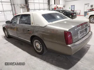 2000 Cadillac DeVille z VIN 1G6KD54Y6YU265538, wystawiony jako IAAI lot #41748755 z przebiegiem 159 676 mil mil oraz . Historia ofert i sprzedaży dostępna na DreamBid. Obrazek 3.