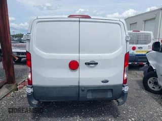 2016 Ford Transit Cargo z VIN 1FTYE1YM5GKB08601, wystawiony jako IAAI lot #42615650 z przebiegiem 275 441 mil mil oraz . Historia ofert i sprzedaży dostępna na DreamBid. Obrazek 16.