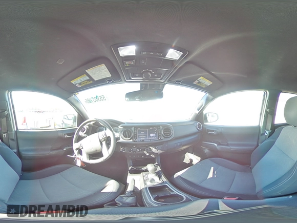 2020 Toyota Tacoma SR5 z VIN 5TFCZ5AN9LX230688, wystawiony jako Copart lot #55305165 z przebiegiem 50 381 mil mil oraz Szkoda całkowita • Salvage title. Historia ofert i sprzedaży dostępna na DreamBid. Obrazek 14.