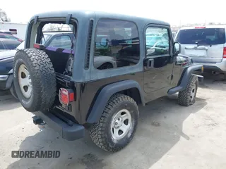 2002 Jeep Wrangler X with VIN 1J4FA39S32P738246, listed as a IAAI auction lot 42106359 with 266,993 mi miles and . Bid and sale history available at DreamBid. Image 4.