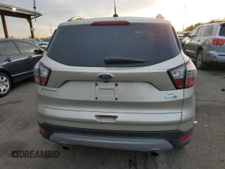 2018 Ford Escape SE z VIN 1FMCU9GD7JUA34635, wystawiony jako Copart lot #48379395 z przebiegiem 123 832 mil mil oraz Szkoda całkowita • Salvage title. Historia ofert i sprzedaży dostępna na DreamBid. Obrazek 6.