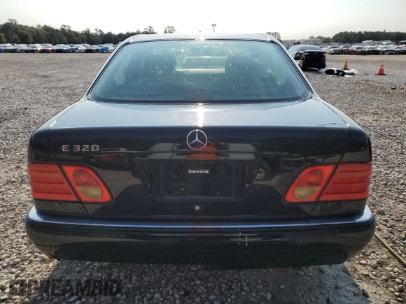 1998 Mercedes-Benz E-Class with VIN WDBJF65FXWA677383, listed as a Copart auction lot 65655114 with 110,333 mi miles and Clean Title. Bid and sale history available at carsss.com. Image 6.