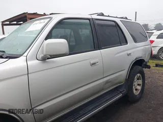 1999 Toyota 4Runner SR5 with VIN JT3HN86RXX0232435, listed as a IAAI auction lot 41473618 with 267,054 mi miles and . Bid and sale history available at DreamBid. Image 15.