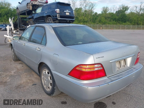 2000 Acura RL with VIN JH4KA9659YC003923, listed as a IAAI auction lot 42007244 with 1 mi miles. Bid and sale history available at carsss.com. Image 3.