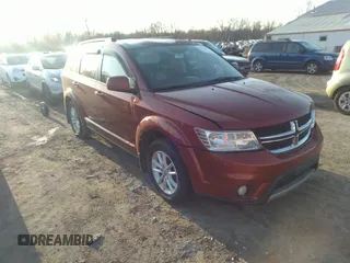 2013 Dodge Journey SXT with VIN 3C4PDCBG4DT659738, listed as a IAAI auction lot 41777689 with 165,050 mi miles. Bid and sale history available at carsss.com. Image 1.