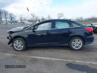 2018 Ford Focus Titanium с VIN 1FADP3J2XJL294107, выставлен на аукционе IAAI как лот 42005814 с пробегом 93 239 миль миль и . История ставок и продаж доступна на DreamBid. Изображение 14.