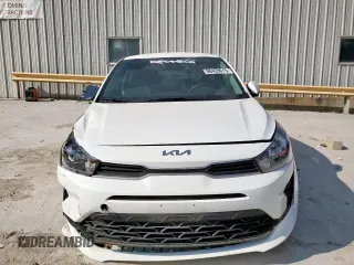 2023 Kia Rio S with VIN 3KPA24AD7PE549736, listed as a Copart auction lot 50428615 with 34,431 mi miles and Salvage Title. Bid and sale history available at carsss.com. Image 5.