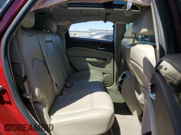 2016 Cadillac SRX Premium Collection z VIN 3GYFNDE32GS514600, wystawiony jako Copart lot #57245825 z przebiegiem 140 834 mil mil oraz Szkoda całkowita • Salvage title. Historia ofert i sprzedaży dostępna na DreamBid. Obrazek 11.