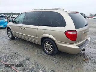 2002 Chrysler Town & Country Limited with VIN 2C8GP64L22R668133, listed as a IAAI auction lot 41941464 with 203,319 mi miles. Bid and sale history available at carsss.com. Image 3.