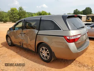 2013 Honda Odyssey EX-L with VIN 5FNRL5H68DB075153, listed as a Copart auction lot 60887325 with 263,001 mi miles and Salvage title. Bid and sale history available at DreamBid. Image 2.