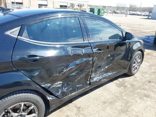 2016 Hyundai Elantra SE with VIN 5NPDH4AE6GH772687, listed as a IAAI auction lot 41870955 with 103,488 mi miles. Bid and sale history available at carsss.com. Image 6.