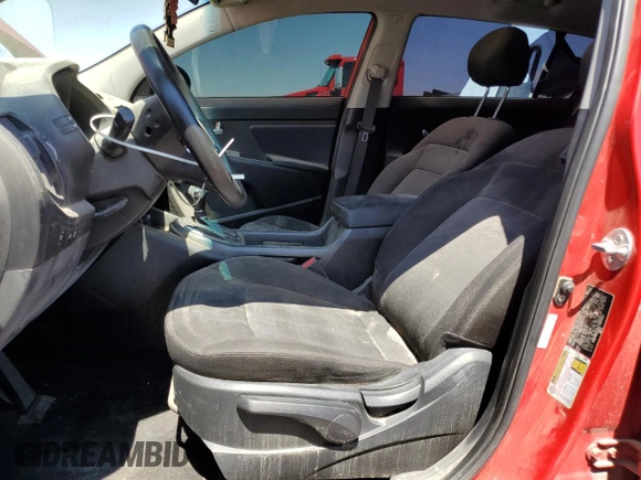 2012 Kia Sportage LX with VIN KNDPB3A25C7345952, listed as a Copart auction lot 57830015 with 101,757 mi miles and Salvage title. Bid and sale history available at DreamBid. Image 7.